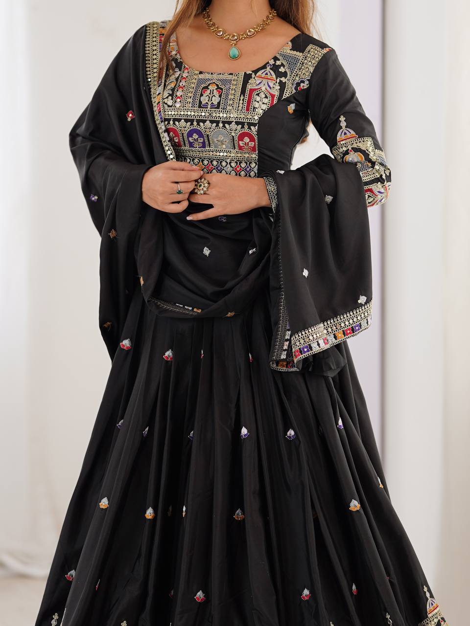 Majestic Midnight Black Designer Lehenga Choli Featuring Intricate Multicolored Architectural Embroidery and Mirror Work